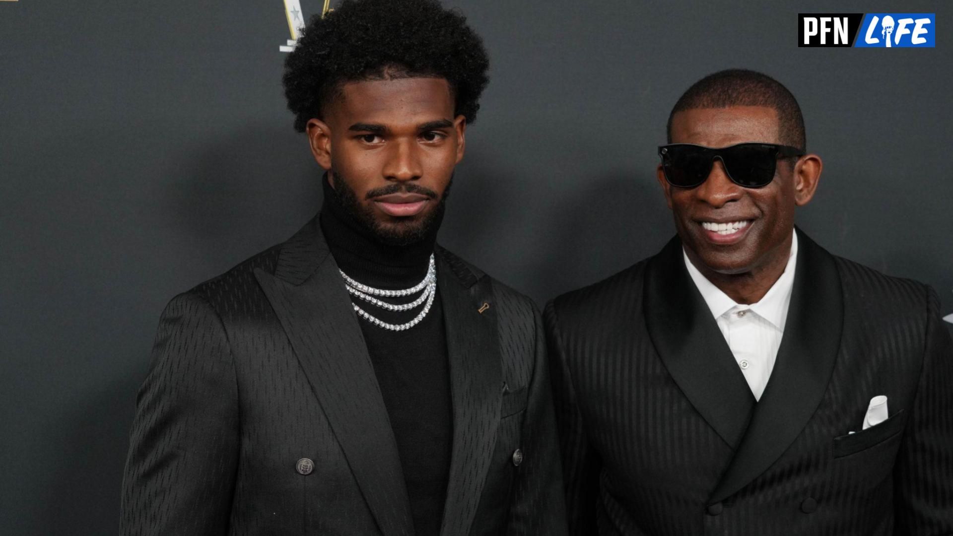 Deion Sanders (right) with his son Shedeur Sanders on the red carpet before Super Bowl LIX NFL Honors at Saenger Theatre.