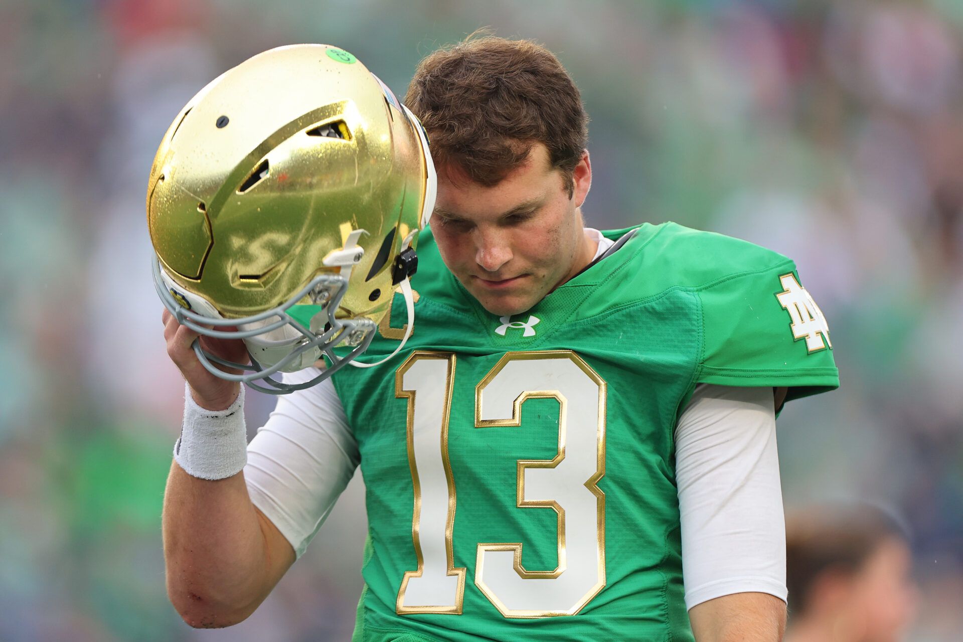SOUTH BEND, INDIANA - SEPTEMBER 28: Riley Leonard #13 of the Notre Dame Fighting Irish reacts against the Louisville Cardinals during the second half at Notre Dame Stadium on September 28, 2024 in South Bend, Indiana. (Photo by Michael Reaves/Getty Images)