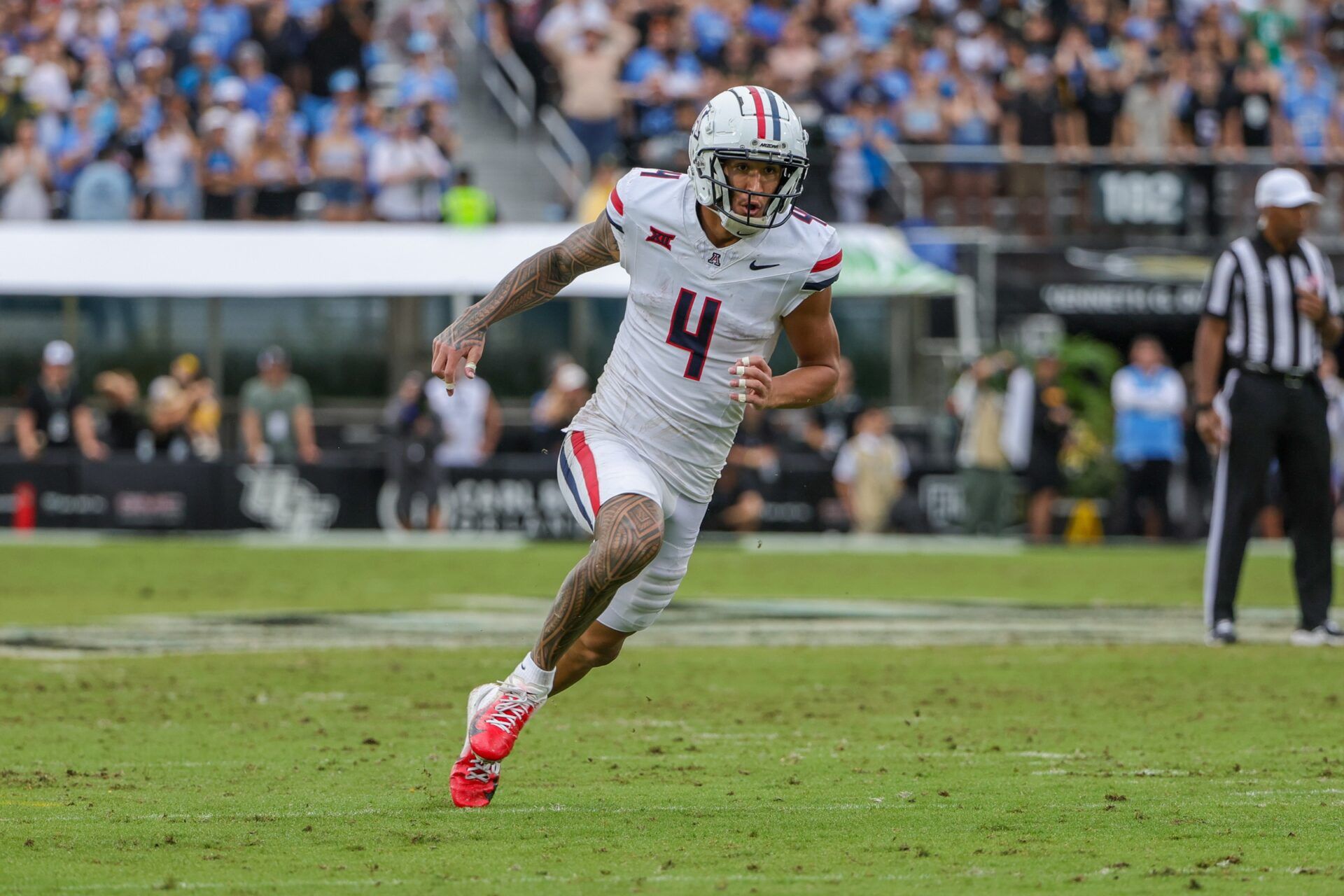 Arizona Wildcats wide receiver Tetairoa McMillan (4) during the second quarter against the UCF Knights at FBC Mortgage Stadium.