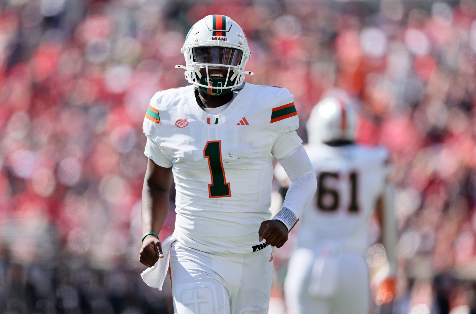 LOUISVILLE, KENTUCKY - OCTOBER 19: Cam Ward #1 of the Miami Hurricanes celebrates after throwing a touchdown pass against the Louisville Cardinals at Cardinal Stadium on October 19, 2024 in Louisville, Kentucky. (Photo by Andy Lyons/Getty Images)
