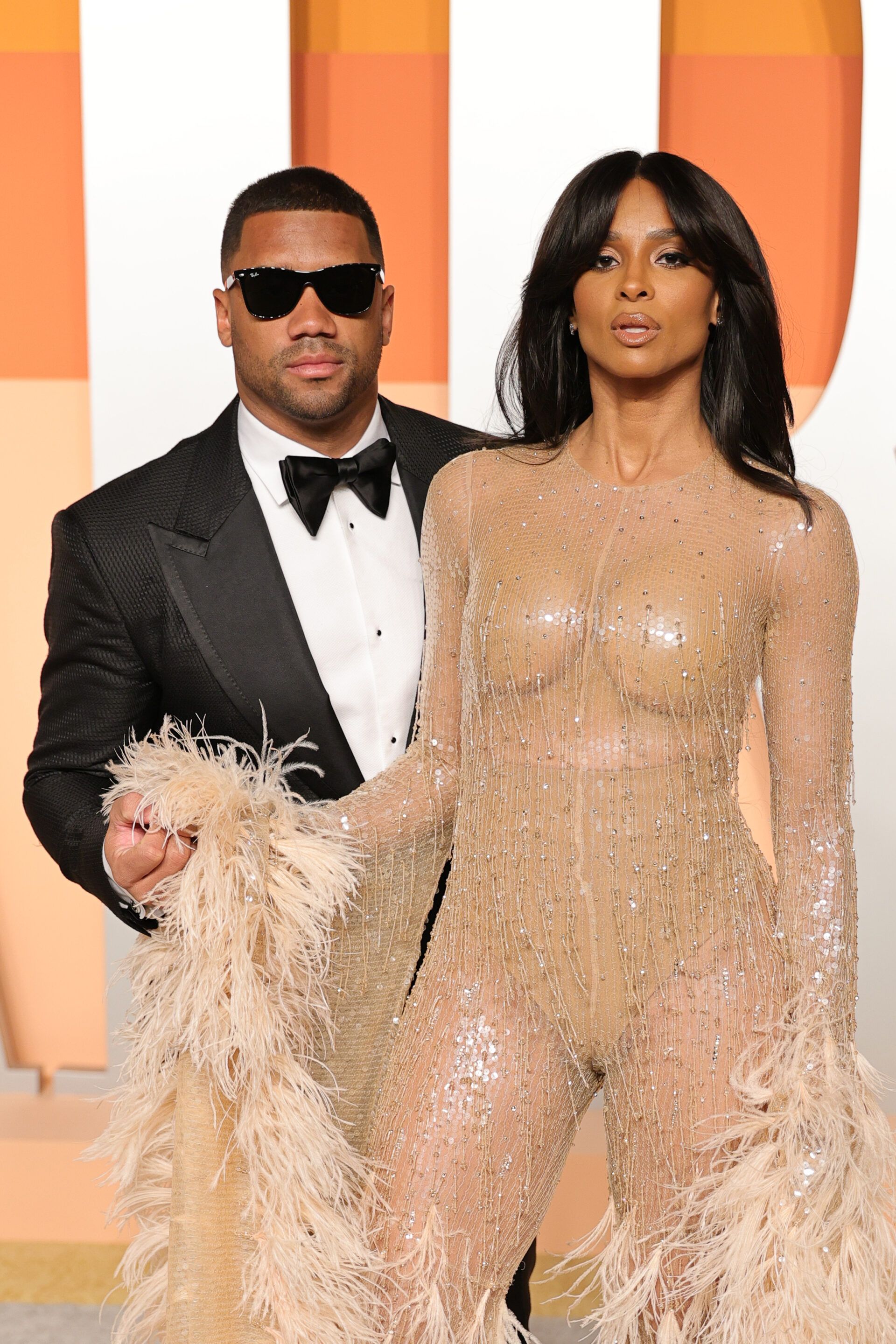 BEVERLY HILLS, CALIFORNIA - MARCH 02: (L-R) Russell Wilson and Ciara attend the 2025 Vanity Fair Oscar Party Hosted By Radhika Jones at Wallis Annenberg Center for the Performing Arts on March 02, 2025 in Beverly Hills, California. (Photo by Neilson Barnard/Getty Images for Vanity Fair)