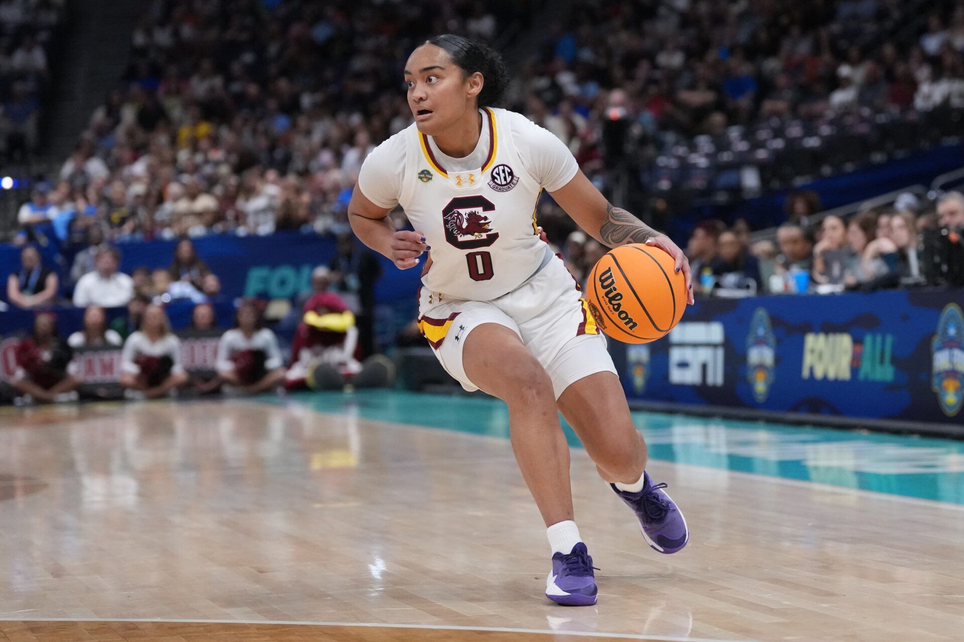 South Carolina Gamecocks guard Te-Hina Paopao (0) dribbles against the Texas Longhorns during the first half in a semifinal of the women's 2025 NCAA tournament at Amalie Arena.