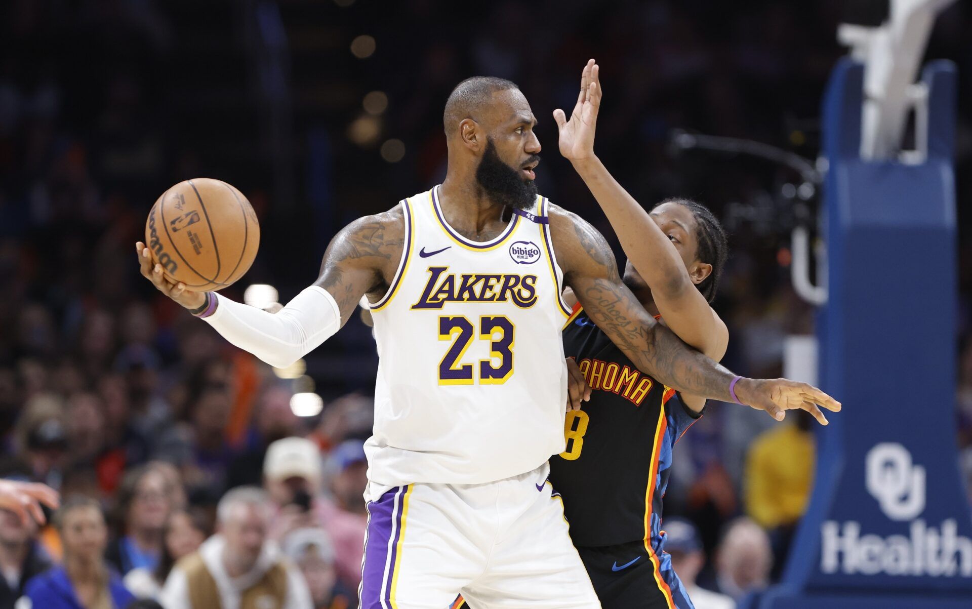 Oklahoma City Thunder forward Jalen Williams (8) defends Los Angeles Lakers forward LeBron James (23) during the second half at Paycom Center.