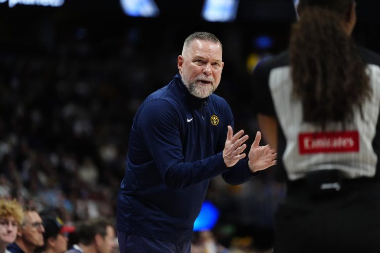 Denver Nuggets head coach Michael Malone reacts towards referee Danielle Scott (87) in the second half against the Indiana Pacers at Ball Arena.