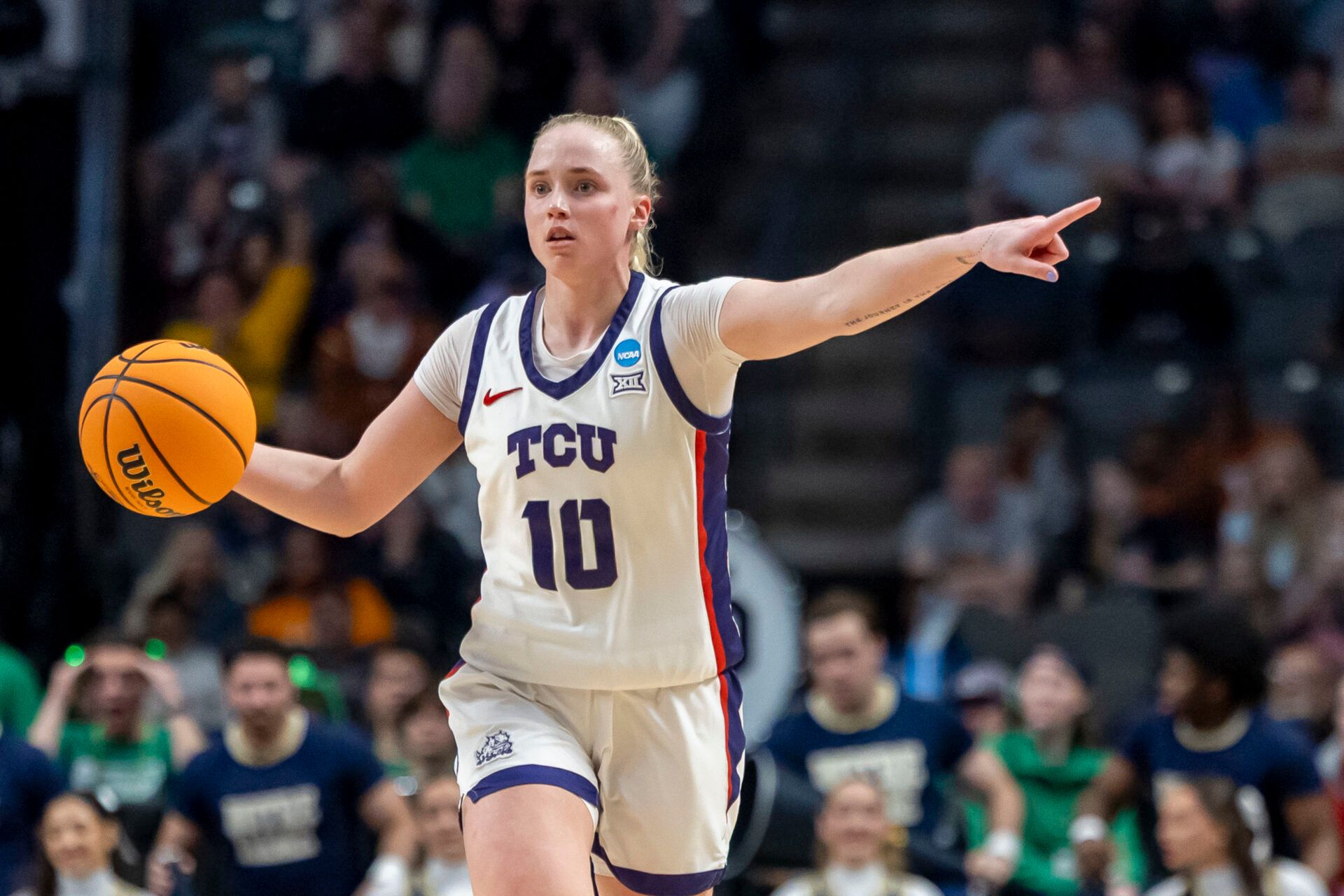 2025 WNBA Draft prospect and former TCU guard Hailey Van Lith dribbles the ball in a game against Notre Dame.