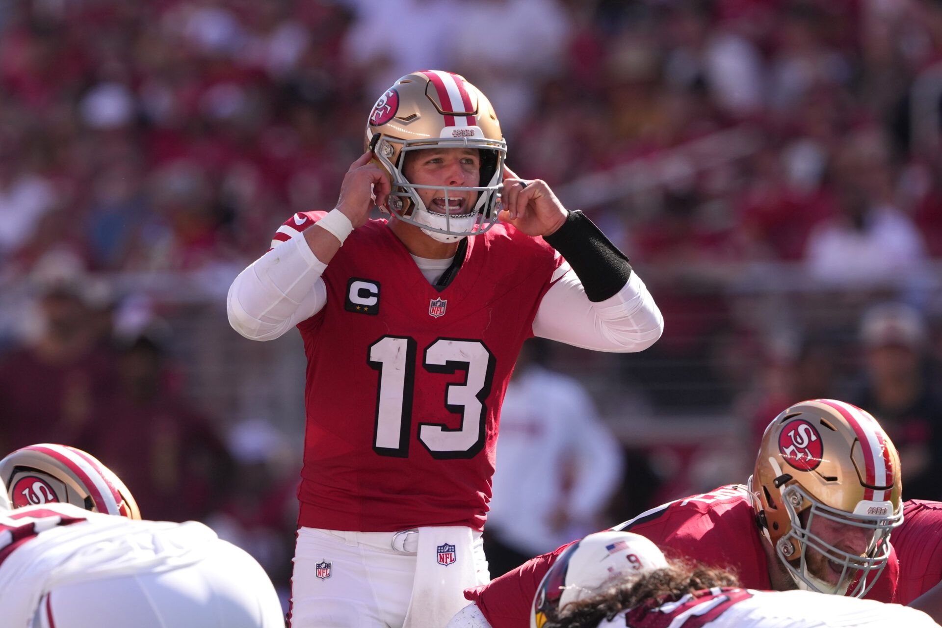 San Francisco 49ers quarterback Brock Purdy (13) yells during the third quarter against the Arizona Cardinals at Levi's Stadium. Mandatory Credit: Darren Yamashita-Imagn Images