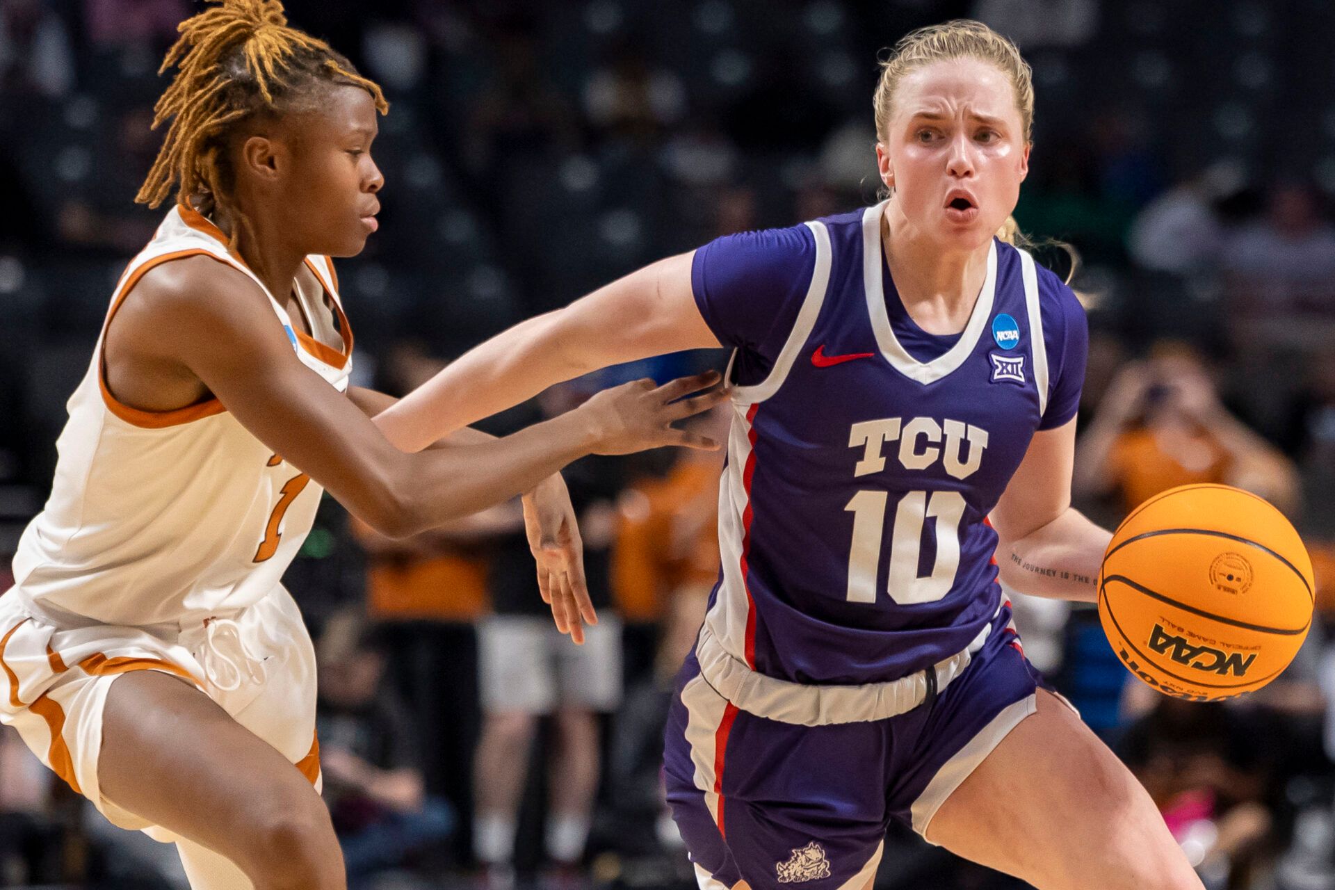 TCU Horned Frogs guard Hailey Van Lith (10) works against Texas Longhorns guard Bryanna Preston (1) during the second half of an Elite 8 NCAA Tournament basketball game at Legacy Arena. Mandatory Credit: Vasha Hunt-Imagn Images