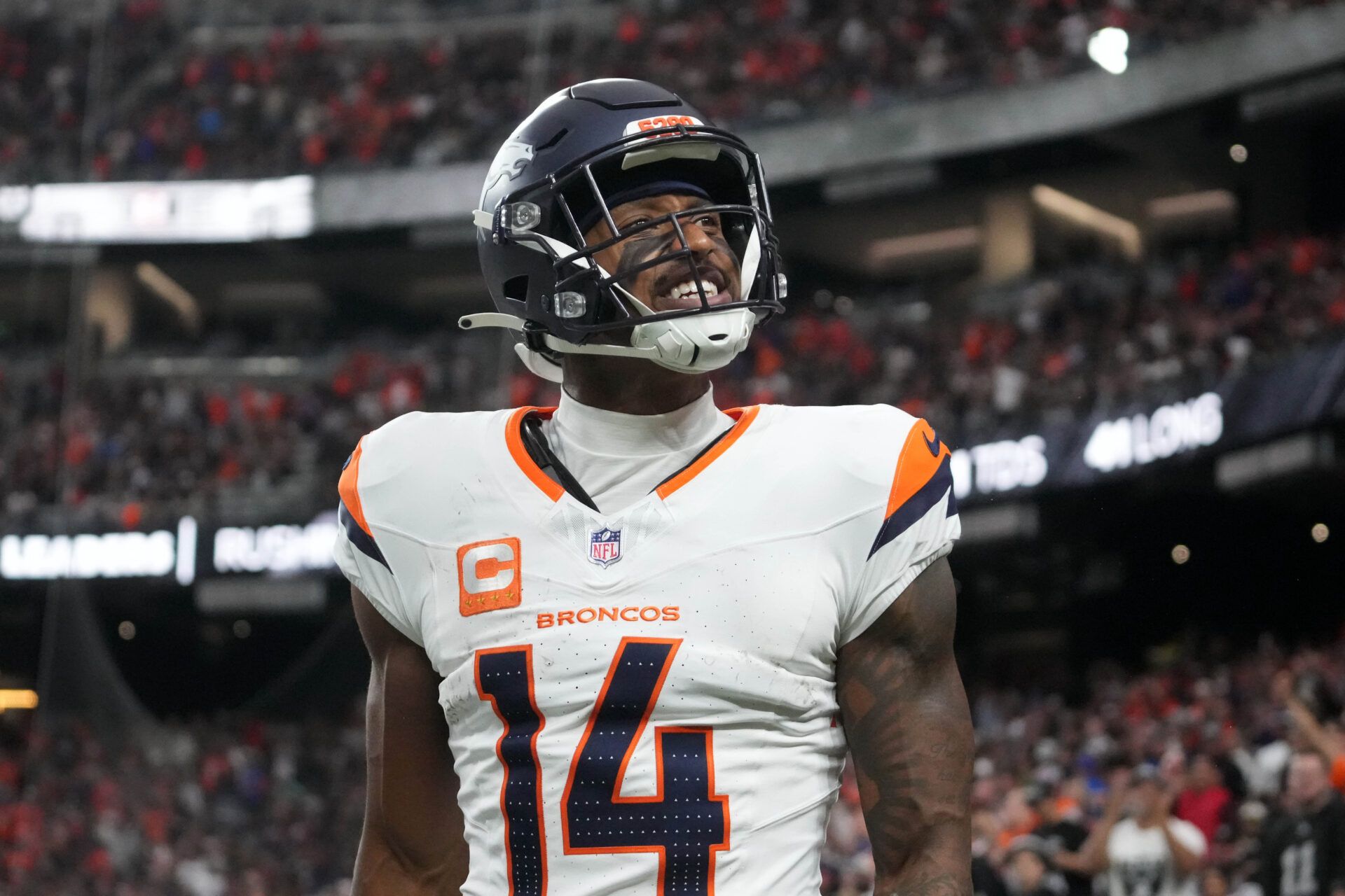 Nov 24, 2024; Paradise, Nevada, USA; Denver Broncos wide receiver Courtland Sutton (14) celebrates after scoring on a 18-yard touchdown pass against the Las Vegas Raiders at Allegiant Stadium. Mandatory Credit: Kirby Lee-Imagn Images