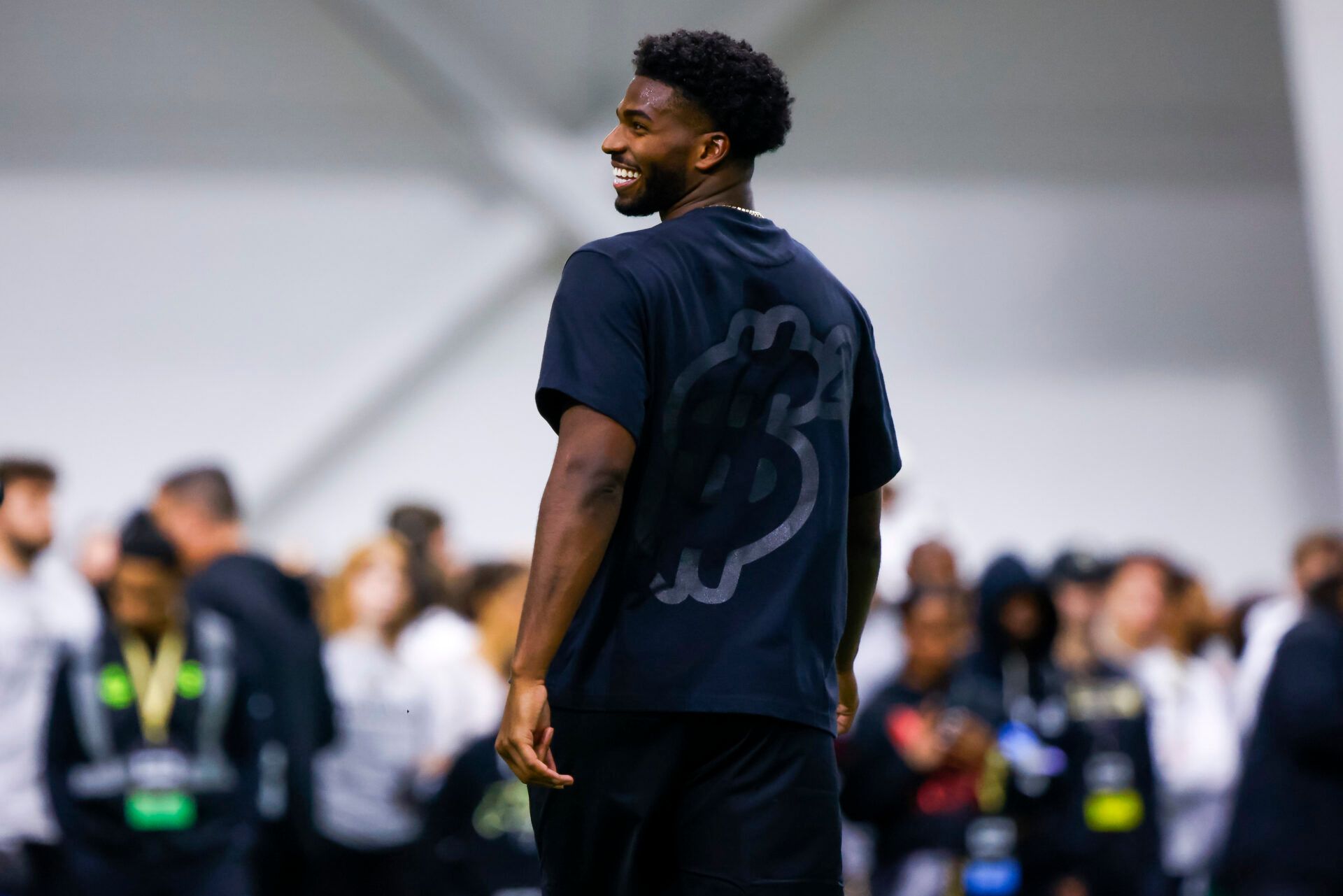 With all eyes on him as the 2025 NFL Draft draws closer, Shedeur Sanders turned mentor for youngsters at a 7-on-7 high school tournament.