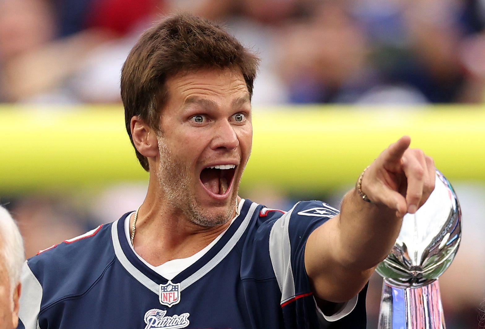 FOXBOROUGH, MASSACHUSETTS - SEPTEMBER 10: Former New England Patriots quarterback Tom Brady reacts during a ceremony honoring him at halftime of New England's game against the Philadelphia Eagles at Gillette Stadium on September 10, 2023 in Foxborough, Massachusetts. (Photo by Maddie Meyer/Getty Images)