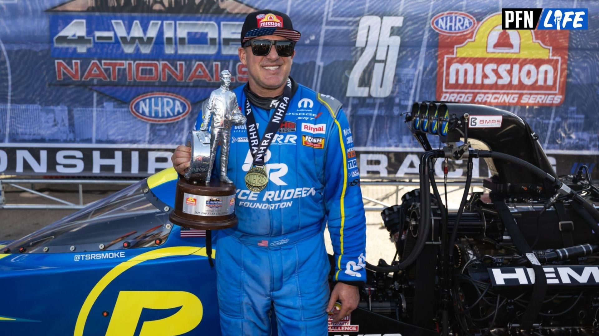 NHRA top fuel driver Tony Stewart celebrates after winning the Four Wide Nationals at The Strip at Las Vegas Motor Speedway. The win is the first of Stewarts professional drag racing career.