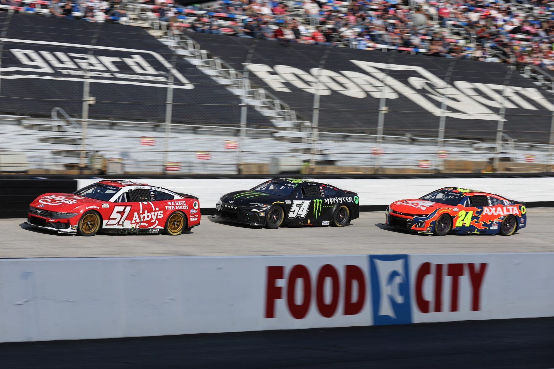NASCAR Cup Series driver Cody Ware (51) and driver Ty Gibbs (54) and driver William Byron (24) during the NASCAR Food City 500 at Bristol Motor Speedway.