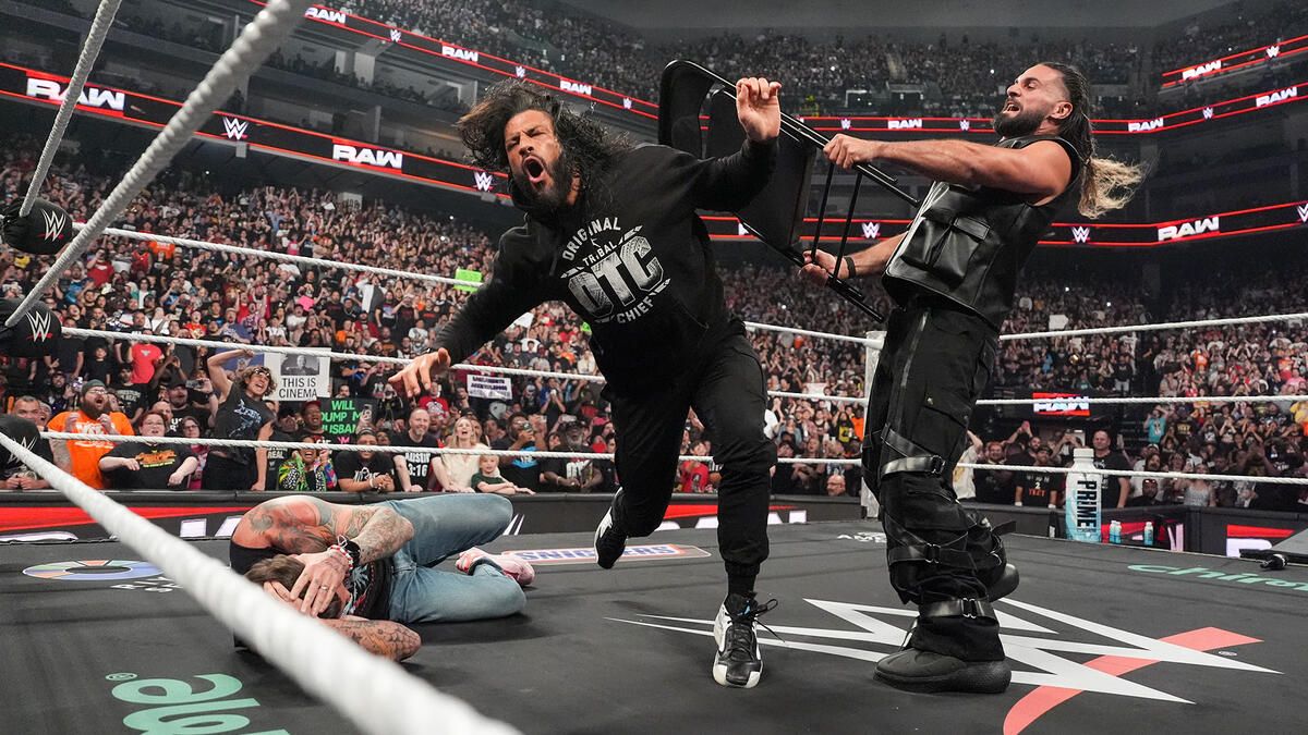 Seth Rollins Lands Brutal Chair Shot on Roman Reigns