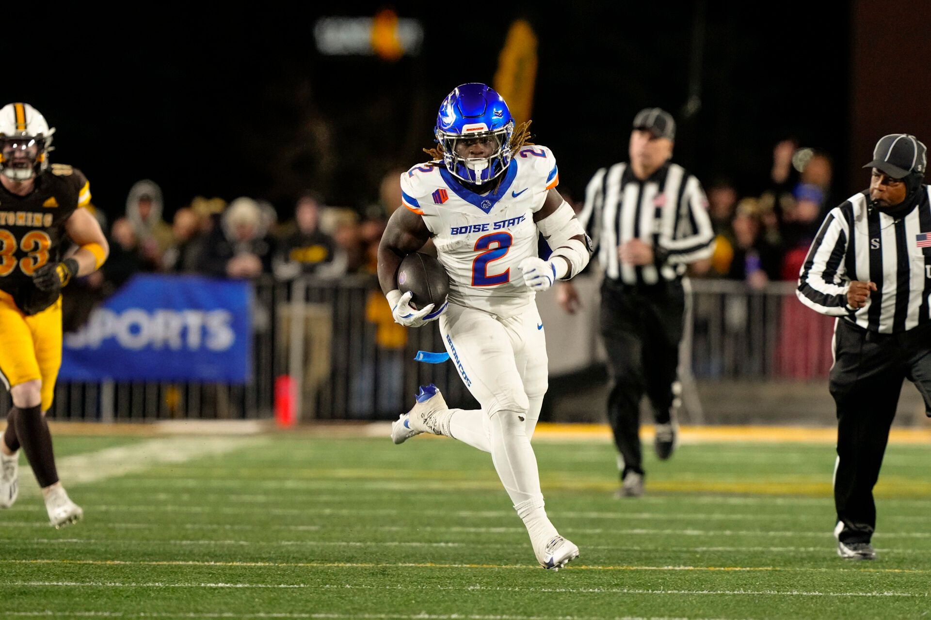 Nov 23, 2024; Laramie, Wyoming, USA; Boise State Broncos running back and Heisman Trophy candidate Ashton Jeanty (2) runs