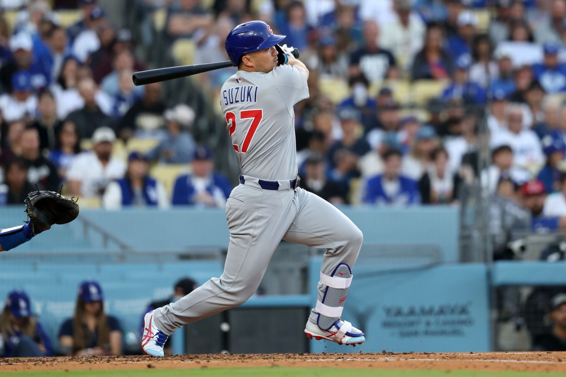 Chicago Cubs outfielder Seiya Suzuki (27) grounds out against the Los Angeles Dodgers during the third inning at Dodger Stadium.