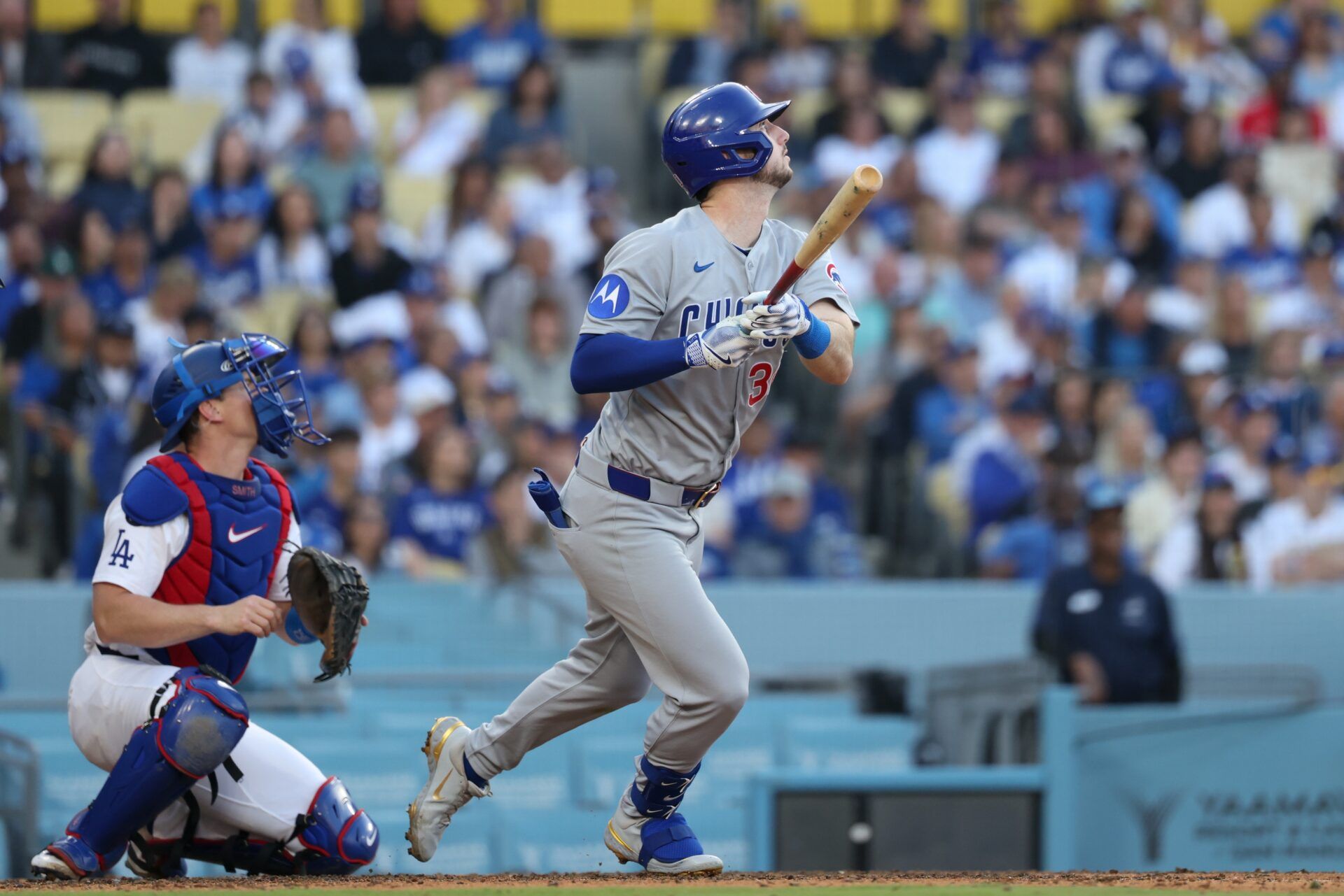 Chicago Cubs outfielder Kyle Tucker (30) hits a ground rule double against the Los Angeles Dodgers during the eighth inning of the game at Dodger Stadium.