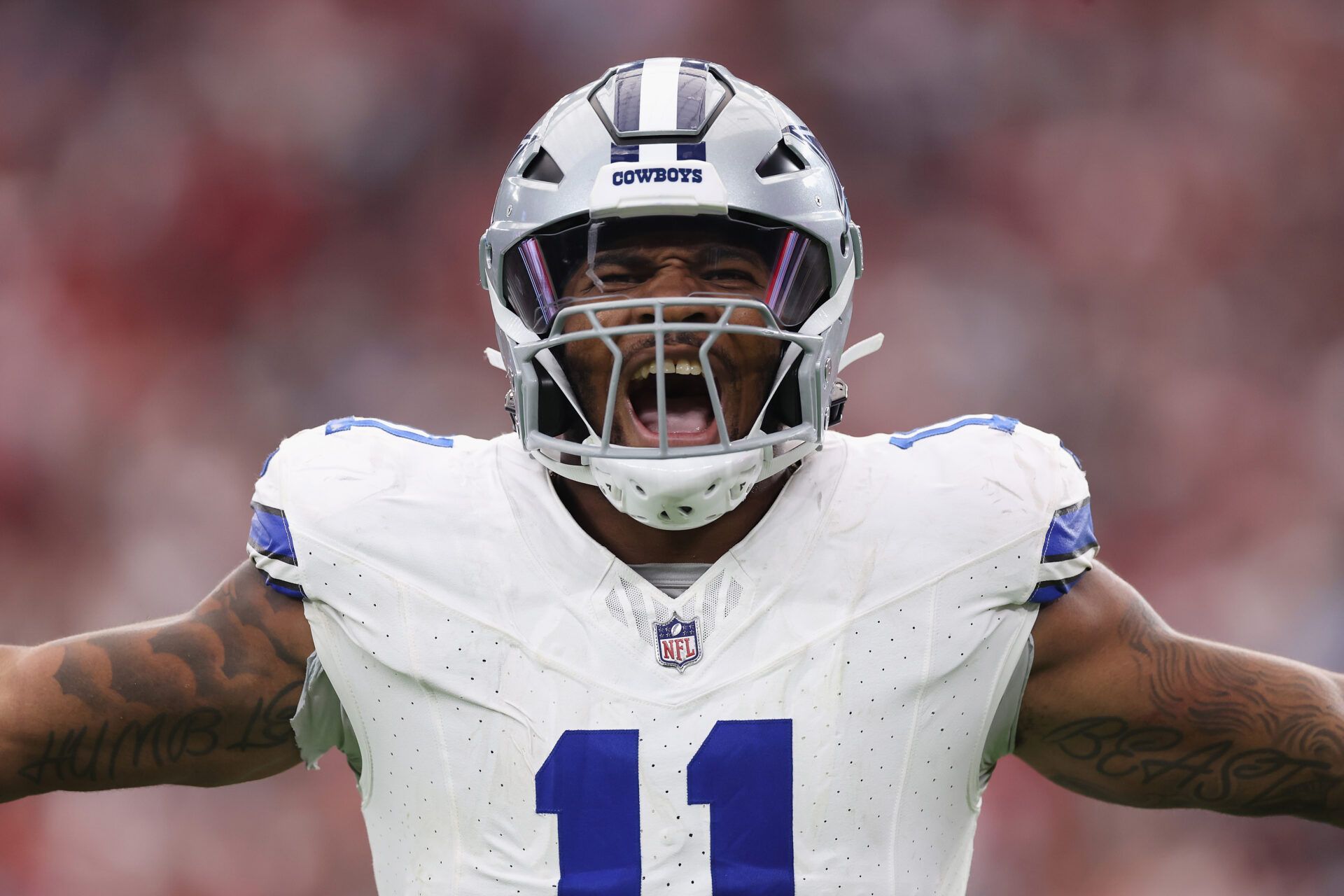 GLENDALE, ARIZONA - SEPTEMBER 24: Linebacker Micah Parsons #11 of the Dallas Cowboys reacts to a sack against the Arizona Cardinals during the NFL game at State Farm Stadium on September 24, 2023 in Glendale, Arizona. The Cardinals defeated the Cowboys 28-16. (Photo by Christian Petersen/Getty Images)