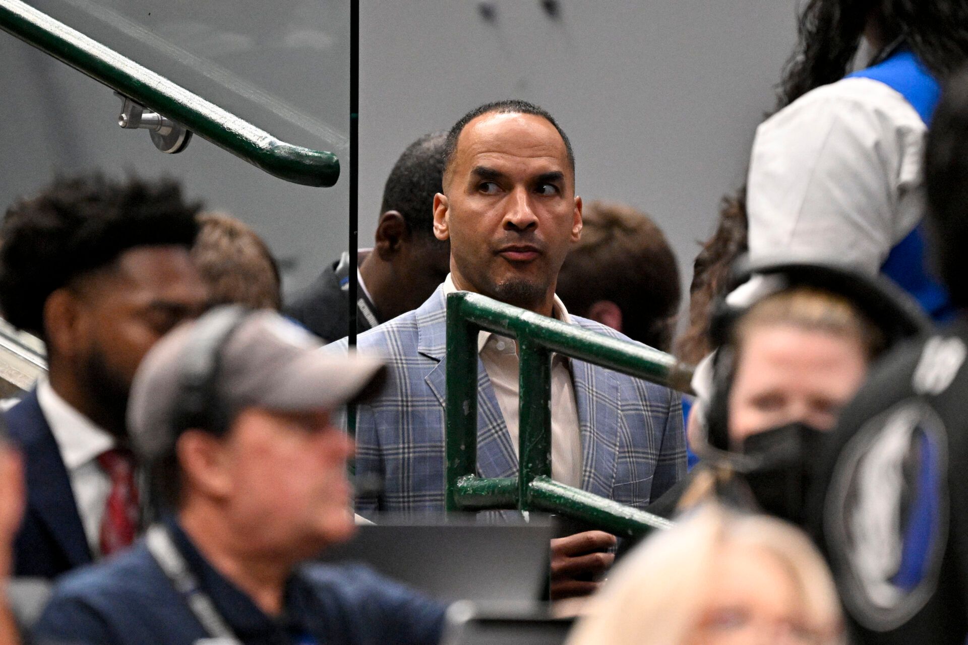 Mavs GM Nico Harrison stood firm amid fan outrage over the Luka Dončić trade, vowing to finish his contract despite “Fire Nico” protests.