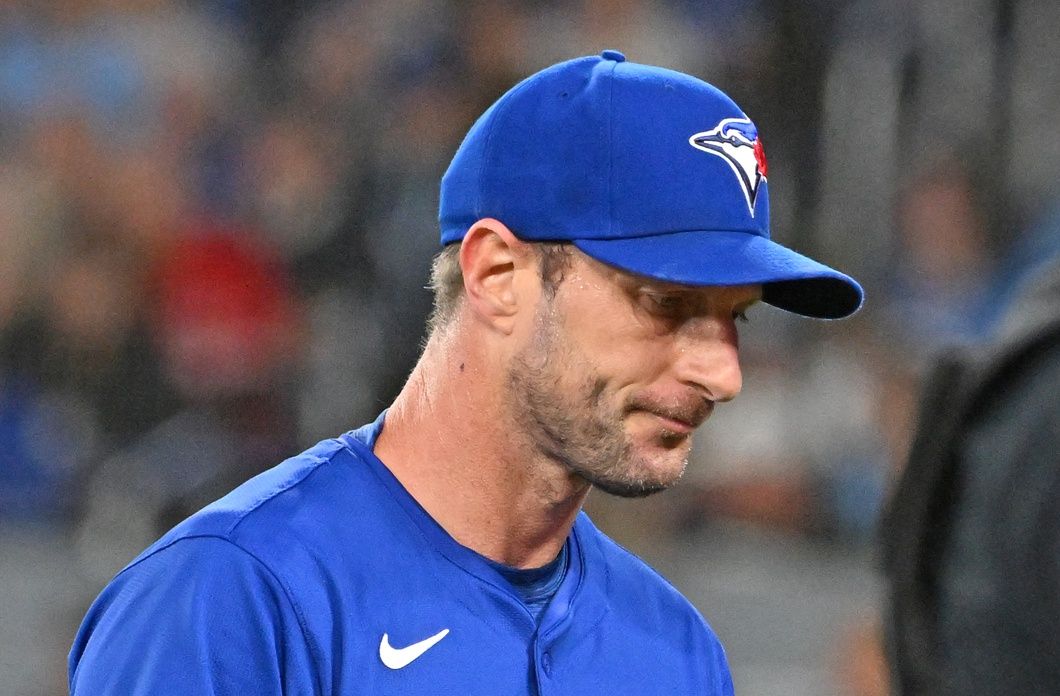 Toronto Blue Jays pitcher Max Scherzer (31) walks to the dugout after giving up two home run against the Baltimore Orioles in the first inning at Rogers Centre.