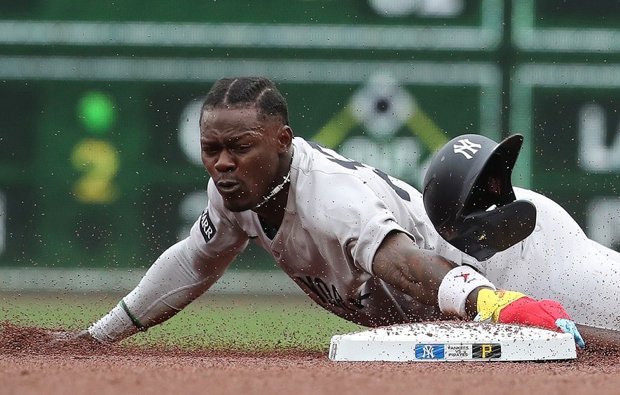 New York Yankees second baseman Jazz Chisholm Jr. (13) steals second base against the Pittsburgh Pirates during the second inning at PNC Park.