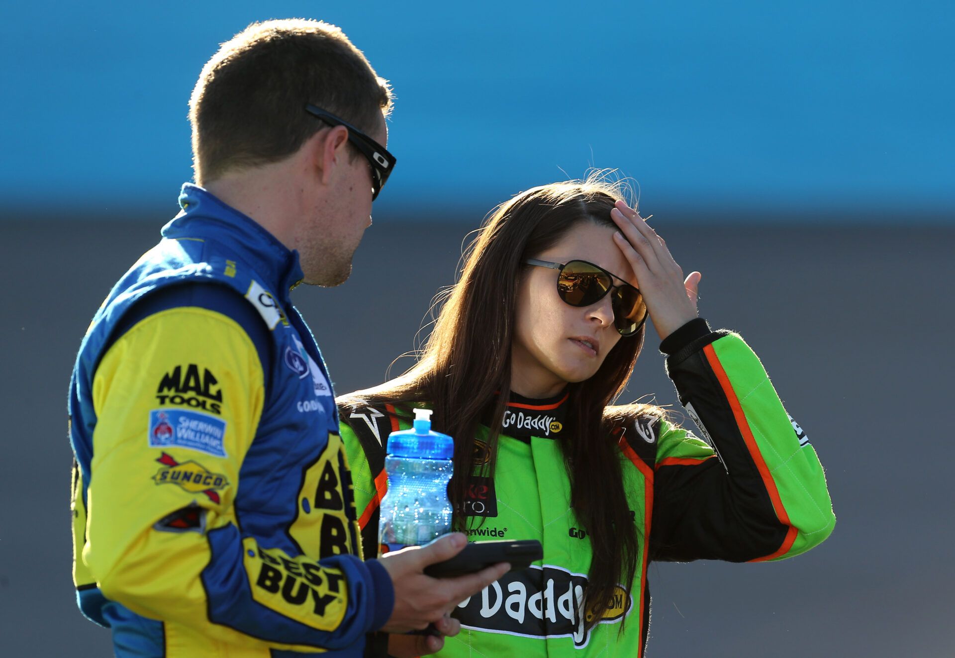 Mar. 1, 2013; Avondale, AZ, USA; NASCAR Sprint Cup Series driver Danica Patrick (right) with boyfriend Ricky Stenhouse Jr during qualifying for the Subway Fresh Fit 500 at Phoenix International Raceway. Mandatory Credit: Mark J. Rebilas-USA TODAY Sports
