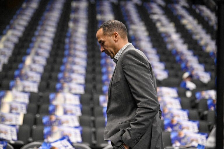 Dallas Mavericks general manager Nico Harrison walks off the court before the game between the Dallas and the Sacramento Kings at the American Airlines Center.