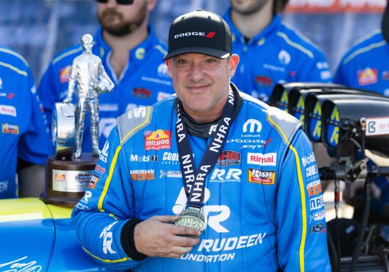 NHRA top fuel driver Tony Stewart celebrates after winning the Four Wide Nationals at The Strip at Las Vegas Motor Speedway. The win is the first of Stewarts professional drag racing career.