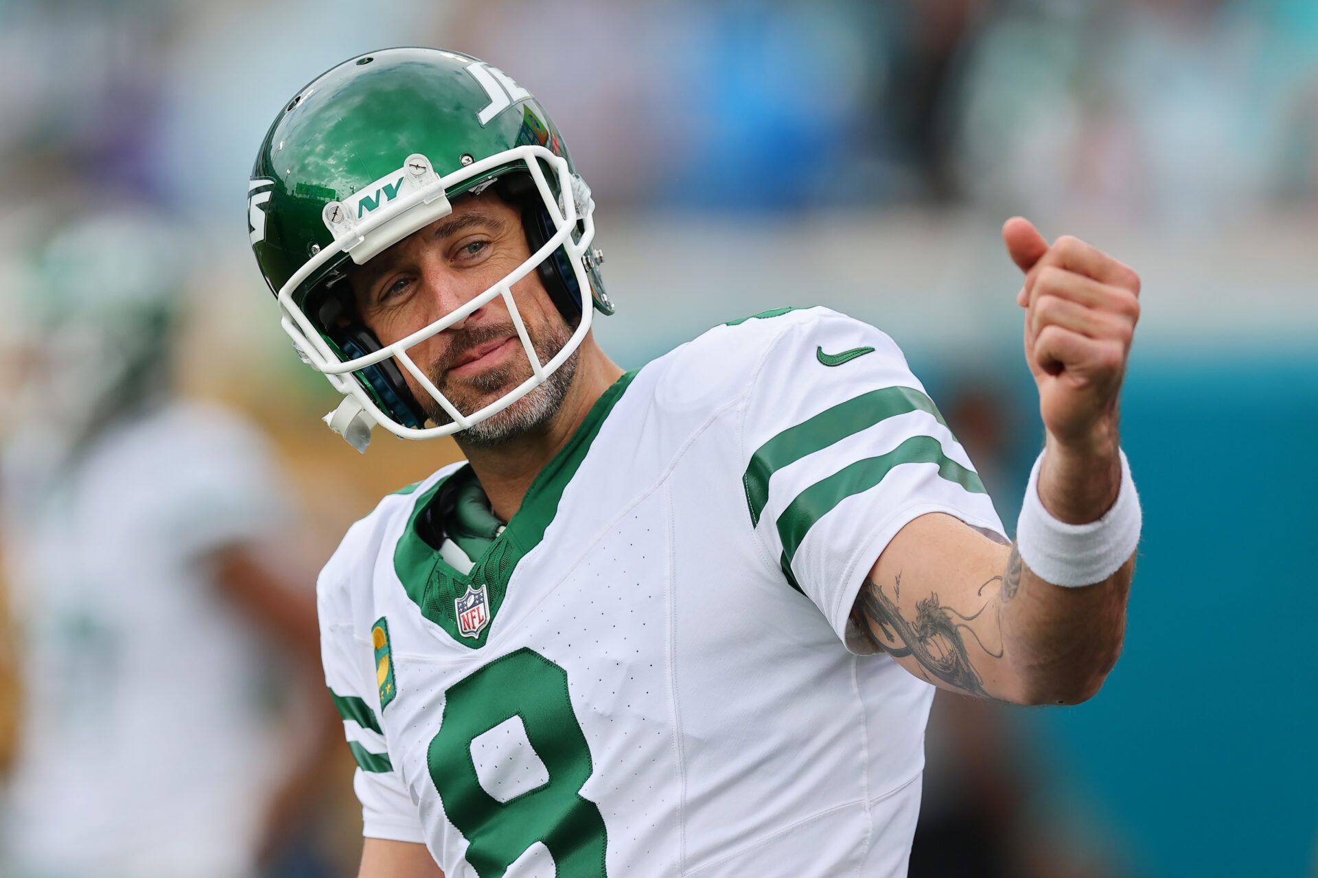 JACKSONVILLE, FLORIDA - DECEMBER 15: Aaron Rodgers #8 of the New York Jets looks on during warmups before the game against the Jacksonville Jaguars at EverBank Stadium on December 15, 2024 in Jacksonville, Florida. (Photo by Mike Carlson/Getty Images)