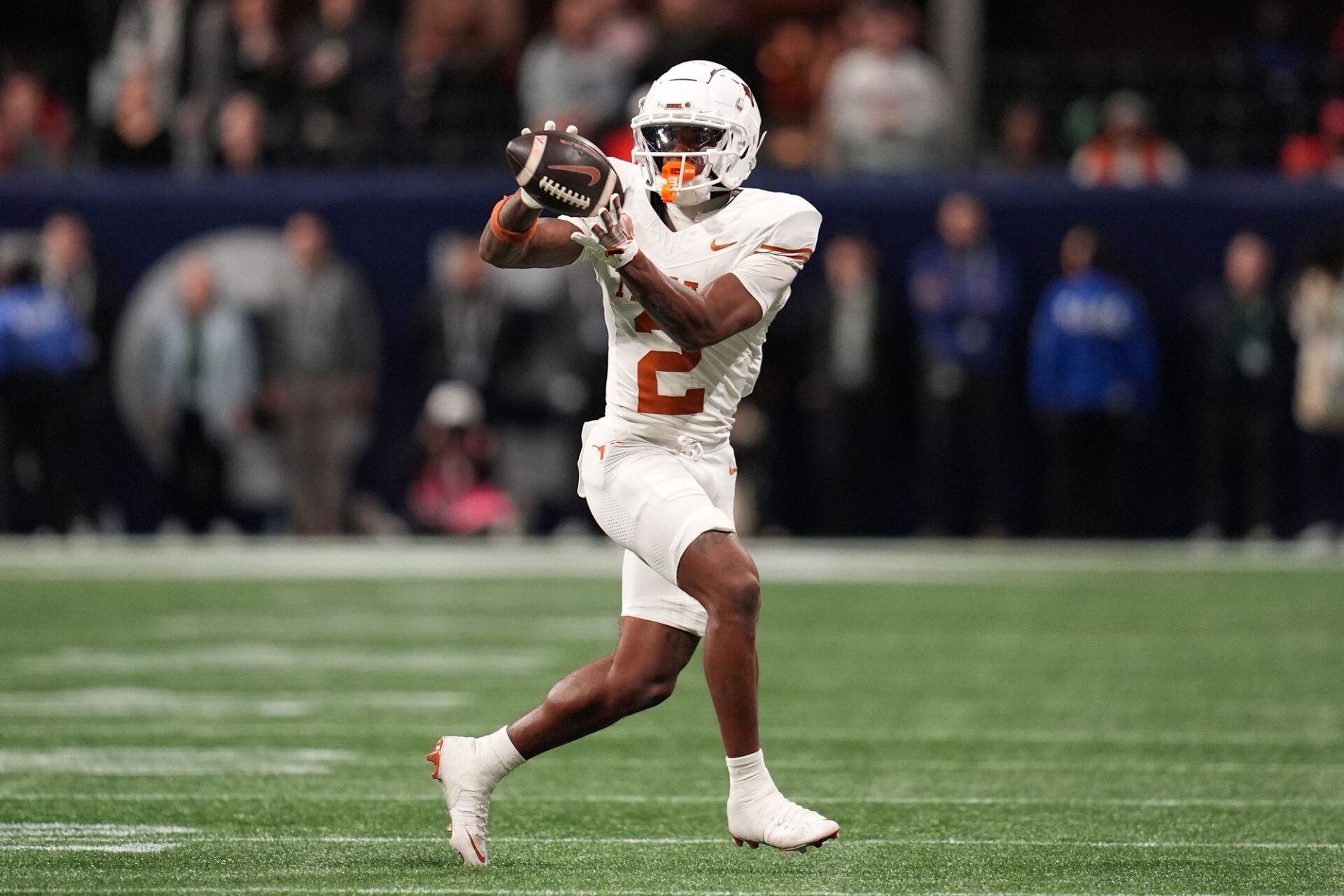 Texas Longhorns wide receiver Matthew Golden (2) makes a catch against the Georgia Bulldogs during the second half in the 2024 SEC Championship game at Mercedes-Benz Stadium.