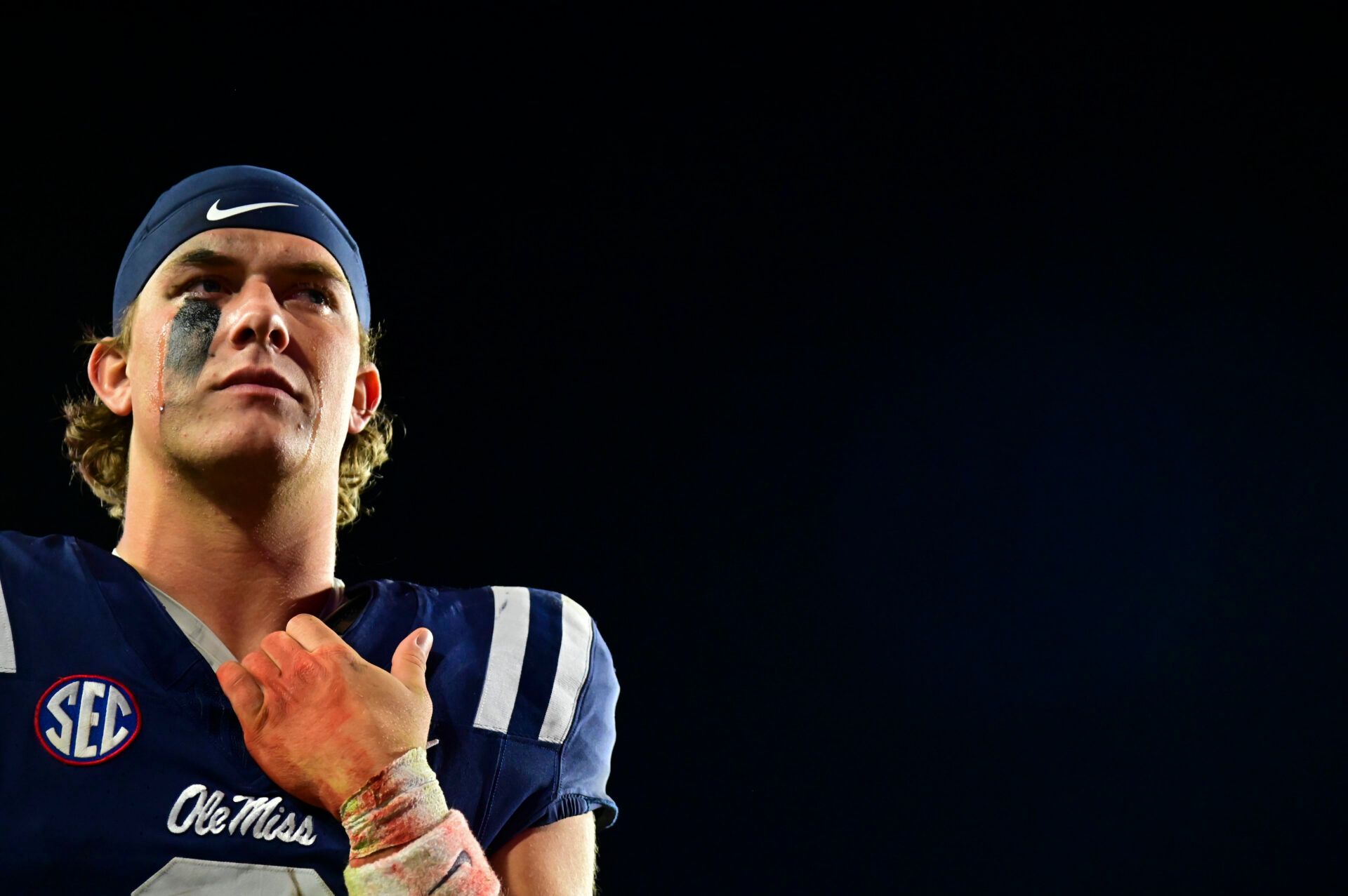Nov 29, 2024; Oxford, Mississippi, USA; Mississippi Rebels quarterback Jaxson Dart (2) reacts after the game against the Mississippi State Bulldogs at Vaught-Hemingway Stadium. Mandatory Credit: Matt Bush-Imagn Images