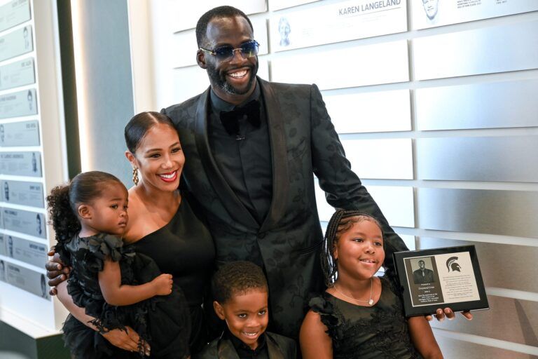 Michigan State University's 2022 Hall of Fame inductee Draymond Green poses for a photo with his family during an induction ceremony on Friday, Sept. 9, 2022, at the Clara Bell Smith Center on the MSU campus in East Lansing. 220909 Msu Hof 099a