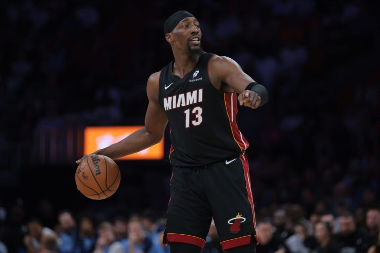 Miami Heat center Bam Adebayo (13) dribbles the basketball against the Memphis Grizzlies during the fourth quarter at Kaseya Center.