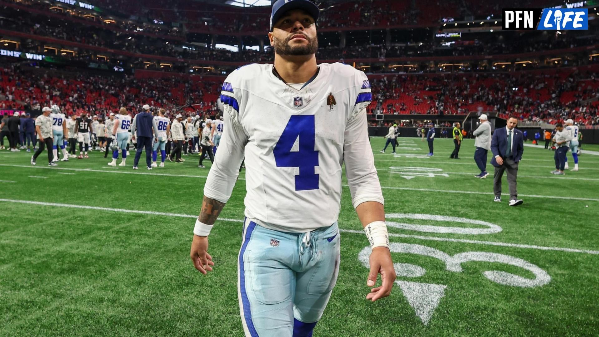 Dallas Cowboys quarterback Dak Prescott (4) walks off the field after a game against the Atlanta Falcons at Mercedes-Benz Stadium.