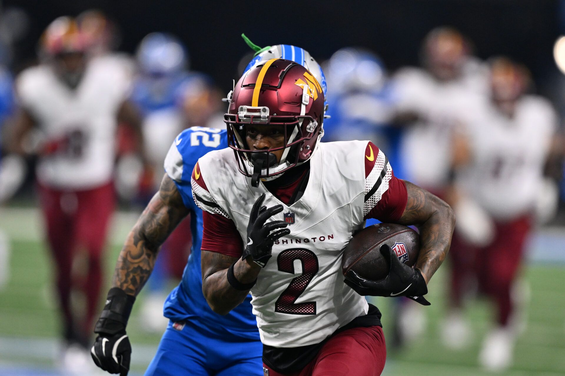 Washington Commanders wide receiver Dyami Brown (2) runs the ball during the first quarter against Detroit Lions in a 2025 NFC divisional round game at Ford Field.