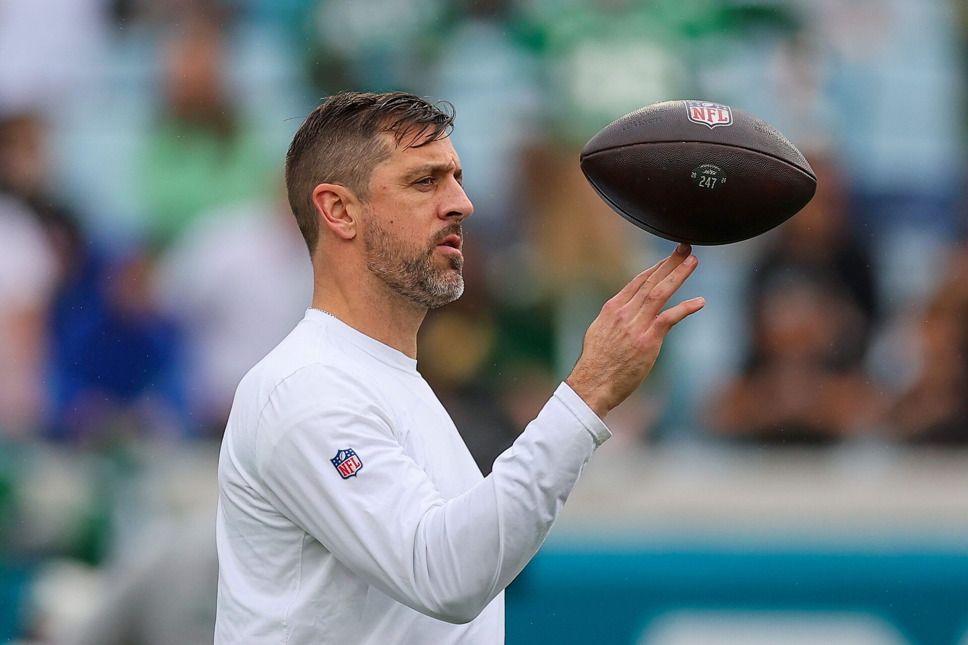 JACKSONVILLE, FLORIDA - DECEMBER 15: Aaron Rodgers #8 of the New York Jets looks on before the game against the Jacksonville Jaguars at EverBank Stadium on December 15, 2024 in Jacksonville, Florida. (Photo by Mike Carlson/Getty Images)