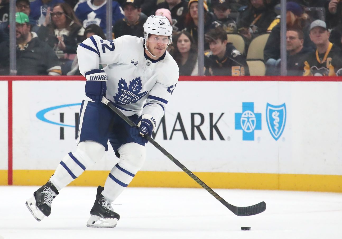 Toronto Maple Leafs defenseman Jake McCabe (22) moves the puck against the Pittsburgh Penguins during the second period at PPG Paints Arena.