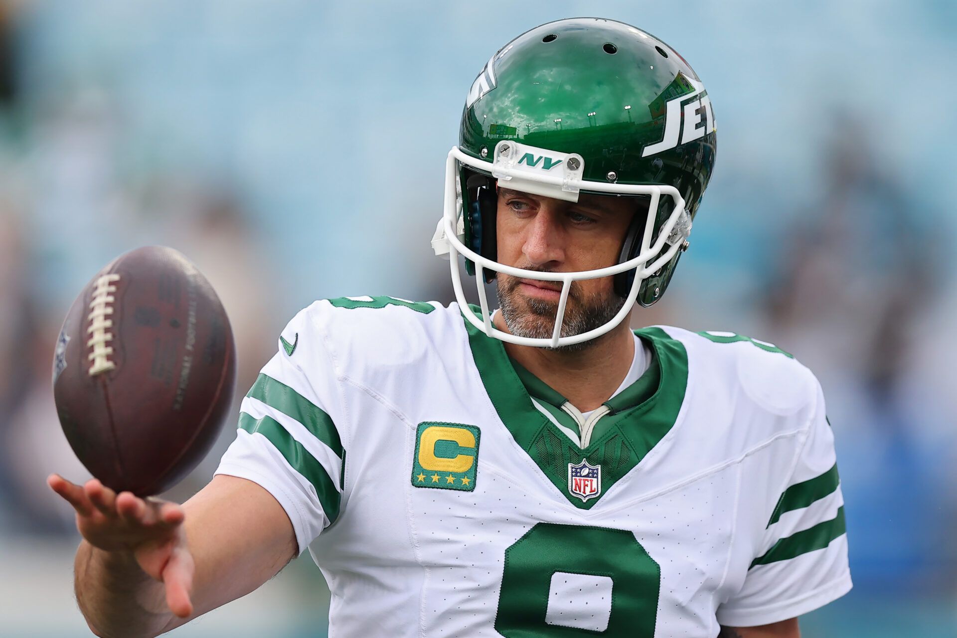 JACKSONVILLE, FLORIDA - DECEMBER 15: Aaron Rodgers #8 of the New York Jets looks on during warmups before the game against the Jacksonville Jaguars at EverBank Stadium on December 15, 2024 in Jacksonville, Florida. (Photo by Mike Carlson/Getty Images)