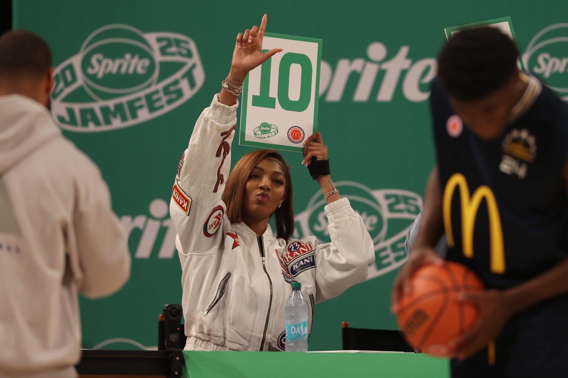 Chicago Sky forward Angel Reese holds up a score card during the Sprite Jam Fest at Barclay's Center.