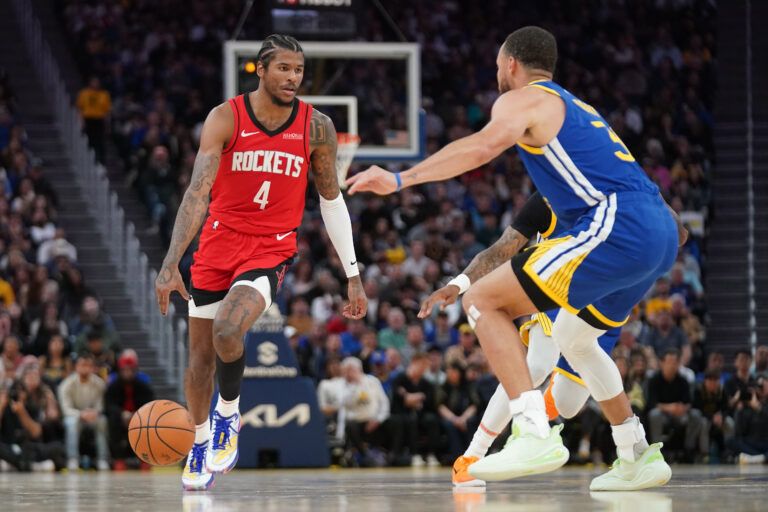 Apr 6, 2025; San Francisco, California, USA; Houston Rockets guard Jalen Green (4) dribbles the ball next to Golden State Warriors guard Stephen Curry (30) in the fourth quarter at the Chase Center. Mandatory Credit: Cary Edmondson-Imagn Images