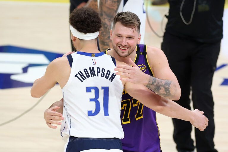 LOS ANGELES, CALIFORNIA - FEBRUARY 25: Luka Doncic #77 of the Los Angeles Lakers greets Klay Thompson #31 of the Dallas Mavericks during the first half of a game at Crypto.com Arena on February 25, 2025 in Los Angeles, California. (Photo by Sean M. Haffey/Getty Images)