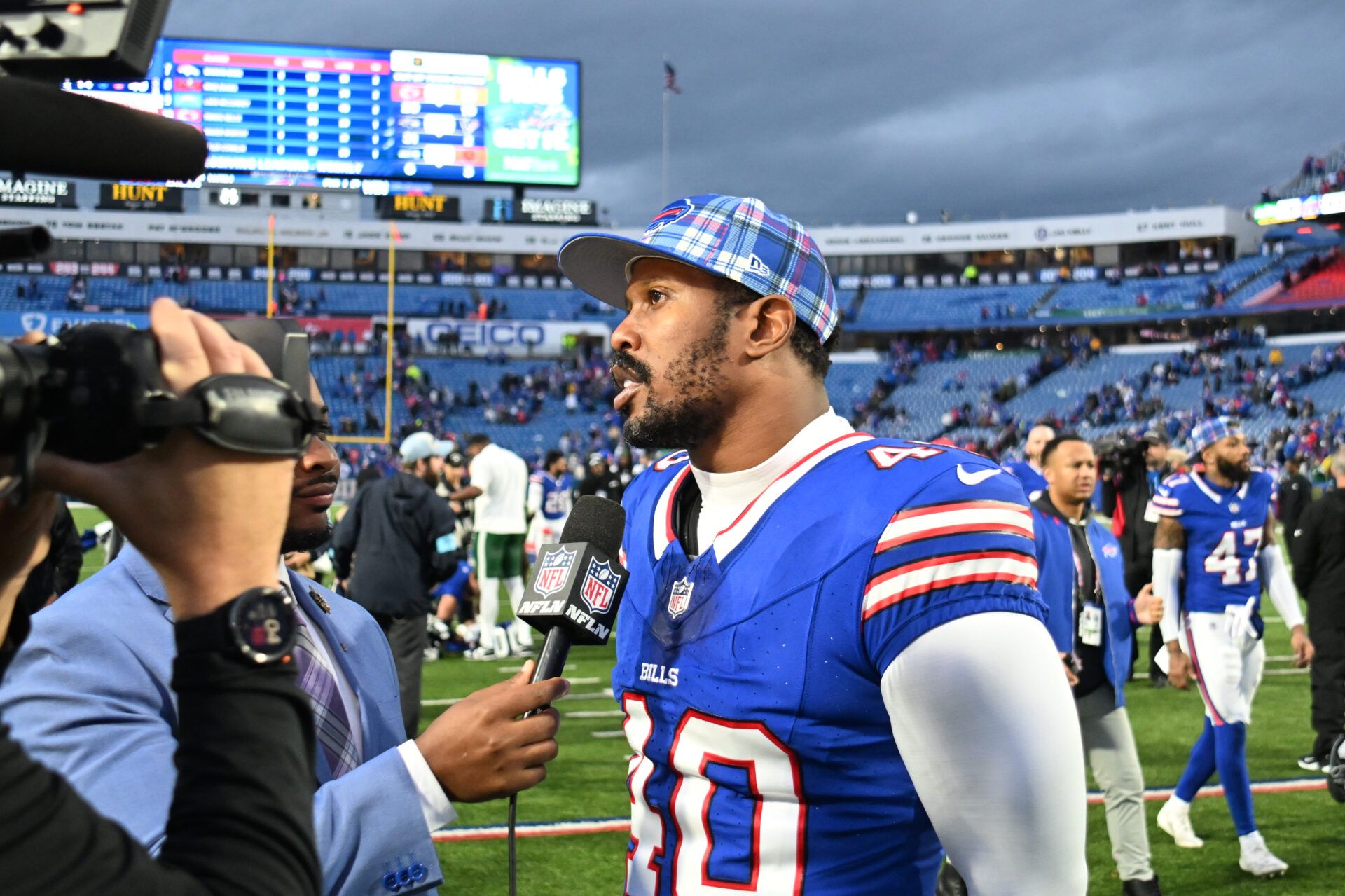 Dec 29, 2024; Orchard Park, New York, USA; Buffalo Bills linebacker Von Miller (40) gives an interview after a game against the New York Jets at Highmark Stadium. Mandatory Credit: Mark Konezny-Imagn Images