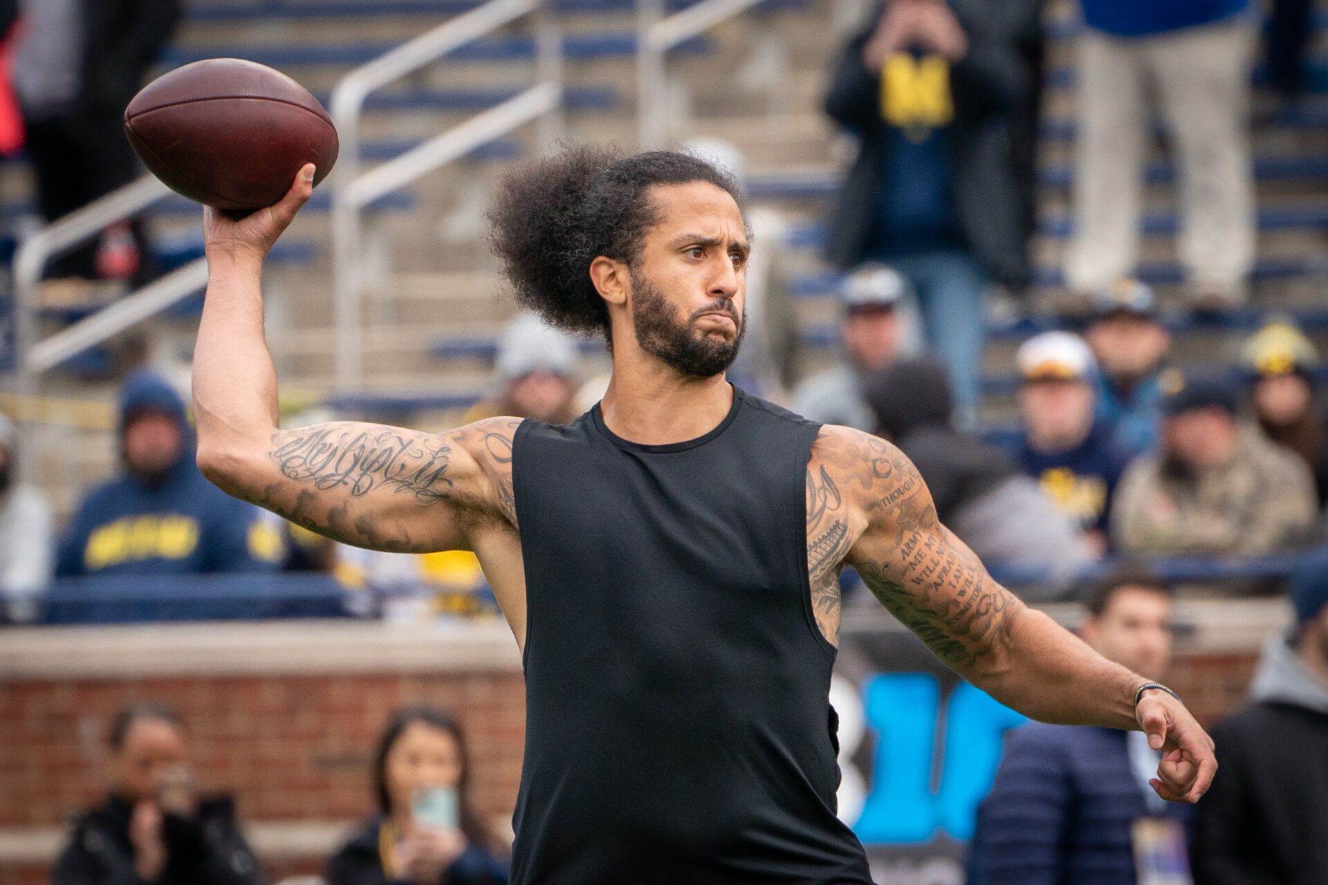 ANN ARBOR, MI - APRIL 02: Colin Kaepernick participates in a throwing exhibition during half time of the Michigan spring football game at Michigan Stadium on April 2, 2022 in Ann Arbor, Michigan. (Photo by Jaime Crawford/Getty Images)