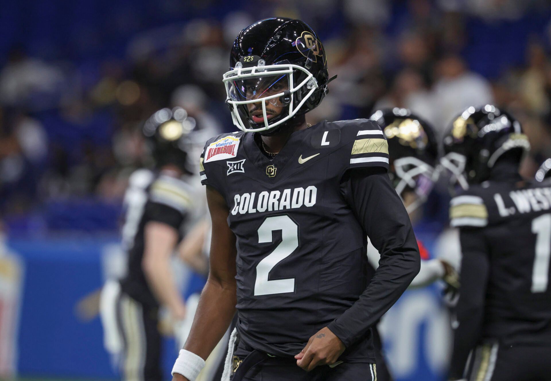 Dec 28, 2024; San Antonio, TX, USA; Colorado Buffaloes quarterback Shedeur Sanders (2) warms up before the game against the Brigham Young Cougars at Alamodome. Mandatory Credit: Troy Taormina-Imagn Images