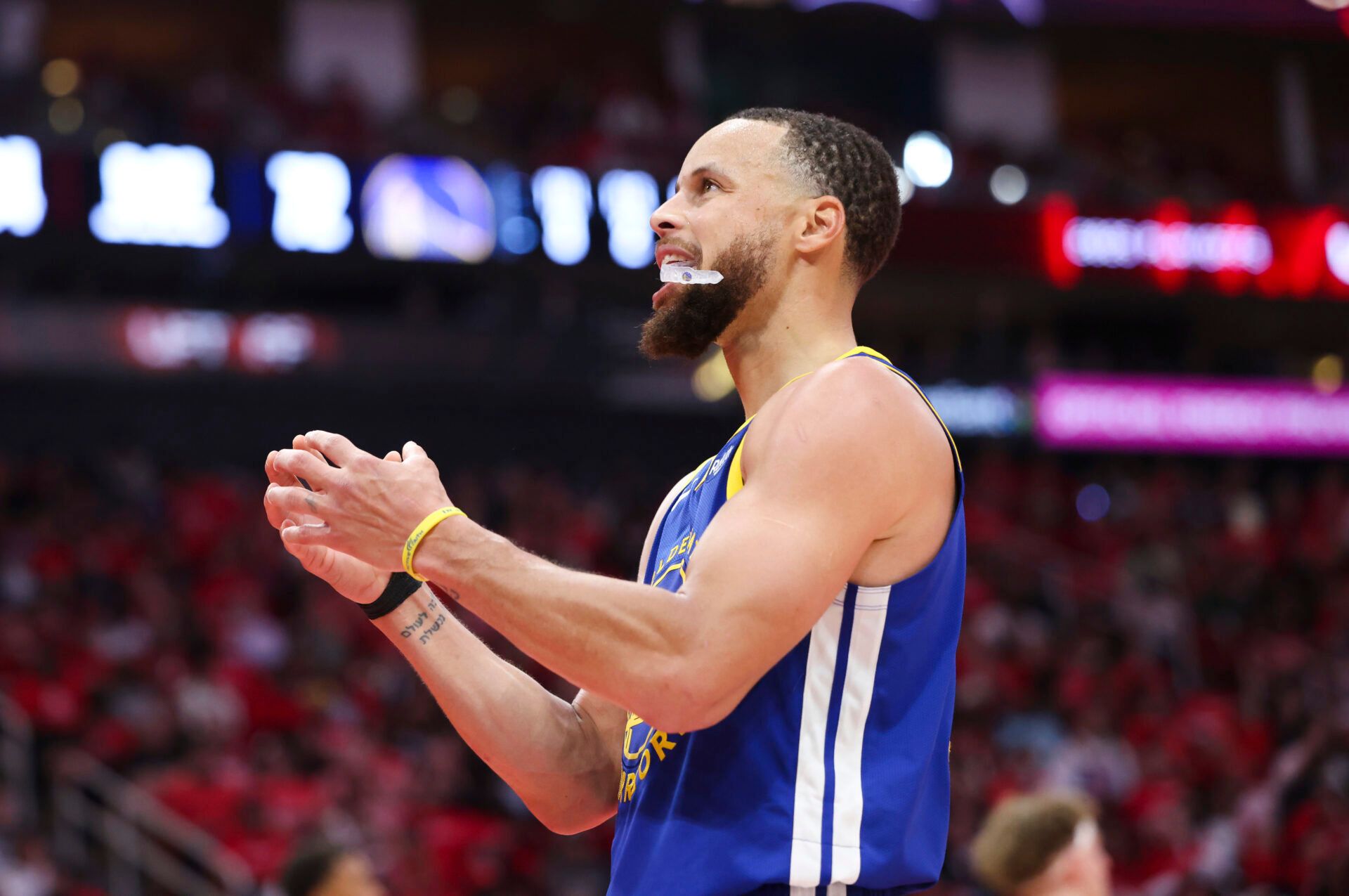Apr 20, 2025; Houston, Texas, USA; Golden State Warriors guard Stephen Curry (30) reacts after a play during the fourth quarter against the Houston Rockets at Toyota Center. Mandatory Credit: Troy Taormina-Imagn Images