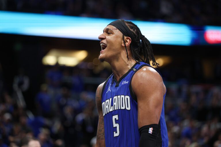 Apr 15, 2025; Orlando, Florida, USA; Orlando Magic forward Paolo Banchero (5) reacts after a play against the Atlanta Hawks in the fourth quarter at Kia Center. Mandatory Credit: Nathan Ray Seebeck-Imagn Images