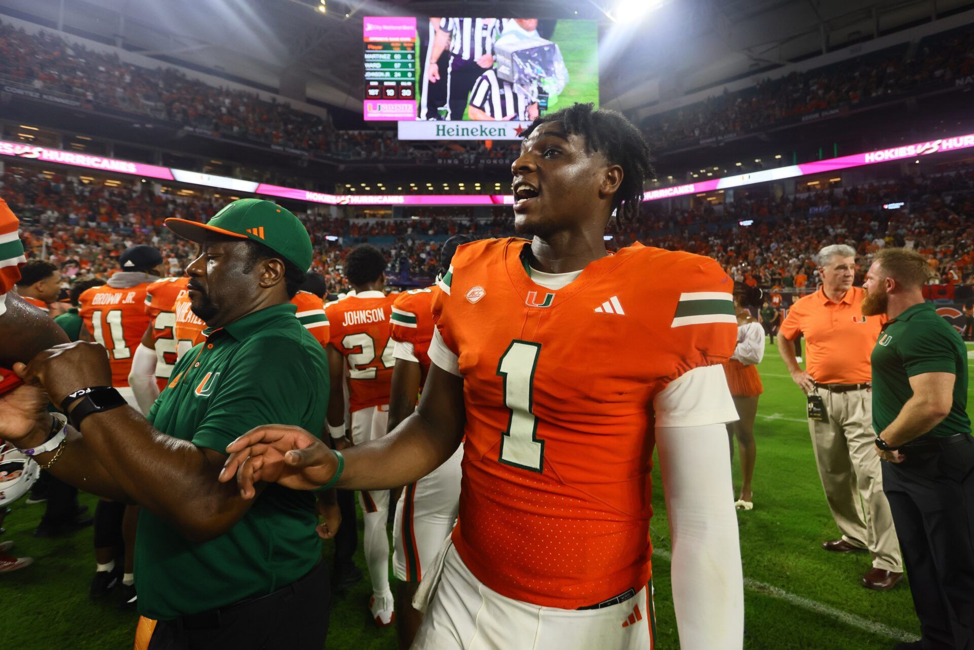 Miami Hurricanes quarterback Cam Ward (1) looks on from the field as officials review the last play of the game against the Virginia Tech Hokies at Hard Rock Stadium.