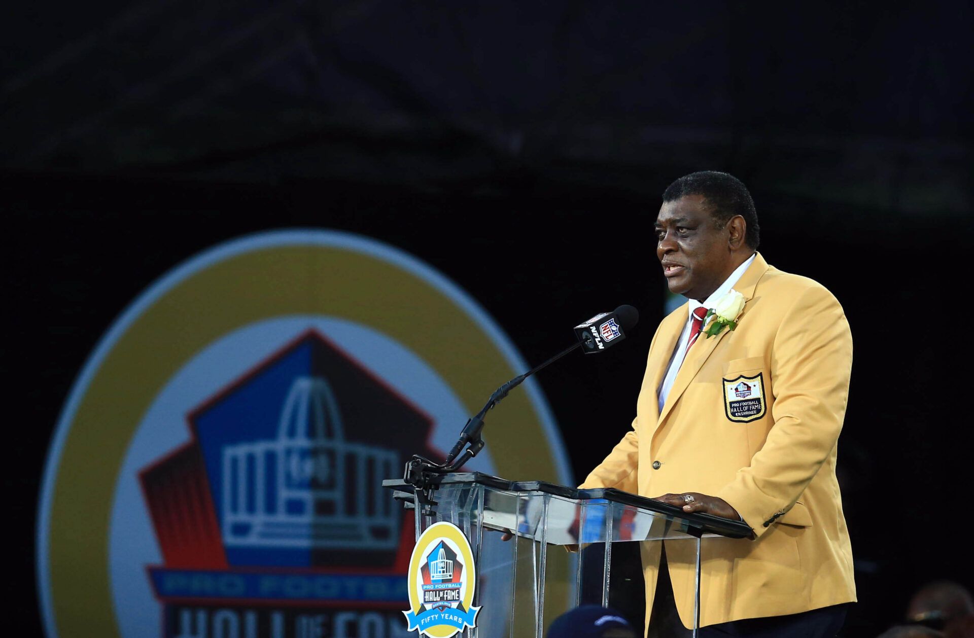 Aug 2, 2013; Canton, OH, USA; Green Bay Packers former linebacker Dave Robinson give his induction speech during the 2013 Pro Football Hall of Fame Enshrinement at Fawcett Stadium. Mandatory Credit: Andrew Weber-USA TODAY Sports