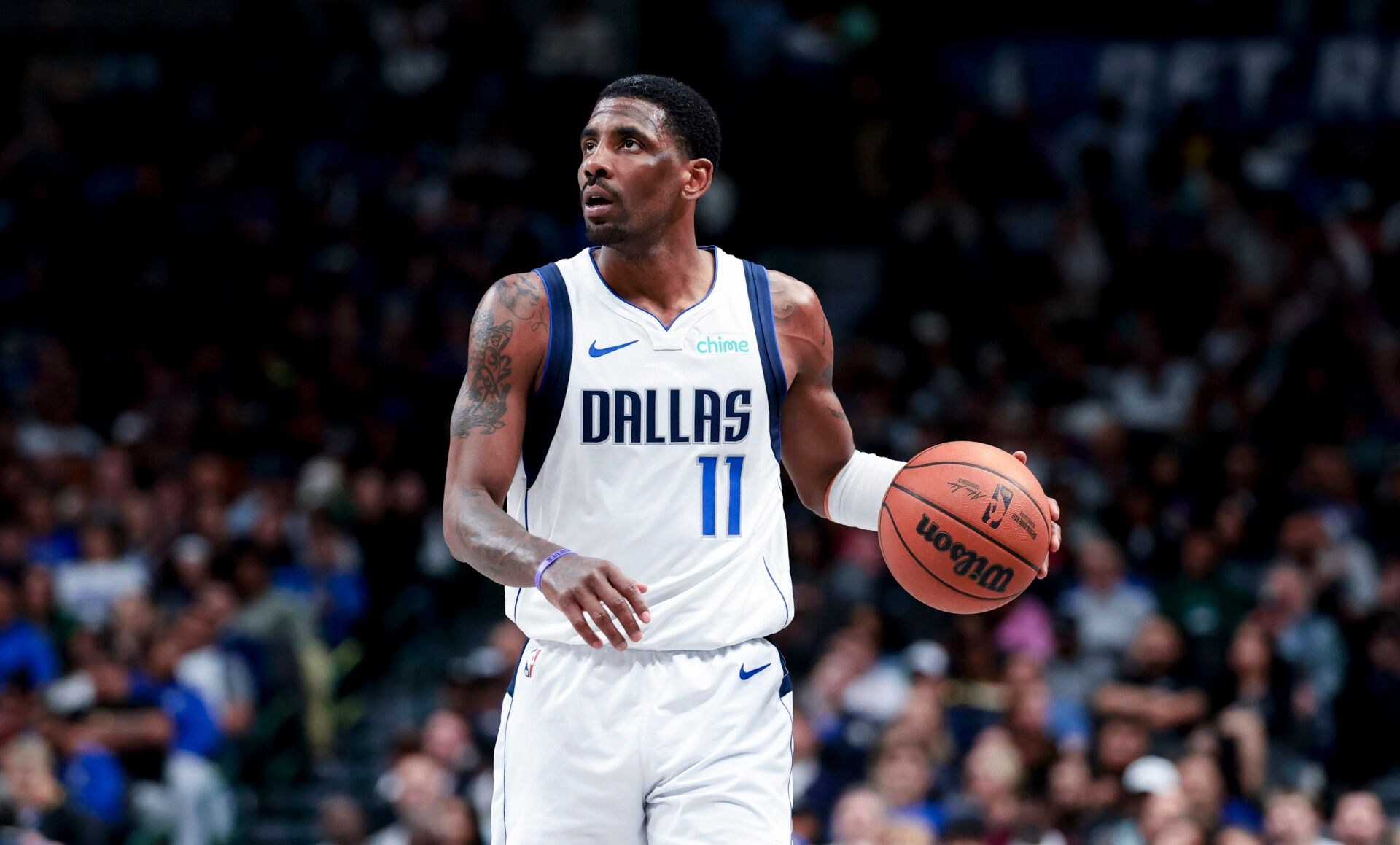 Feb 27, 2025; Dallas, Texas, USA; Dallas Mavericks guard Kyrie Irving (11) controls the ball against the Charlotte Hornets during the second half at American Airlines Center. Mandatory Credit: Kevin Jairaj-Imagn Images