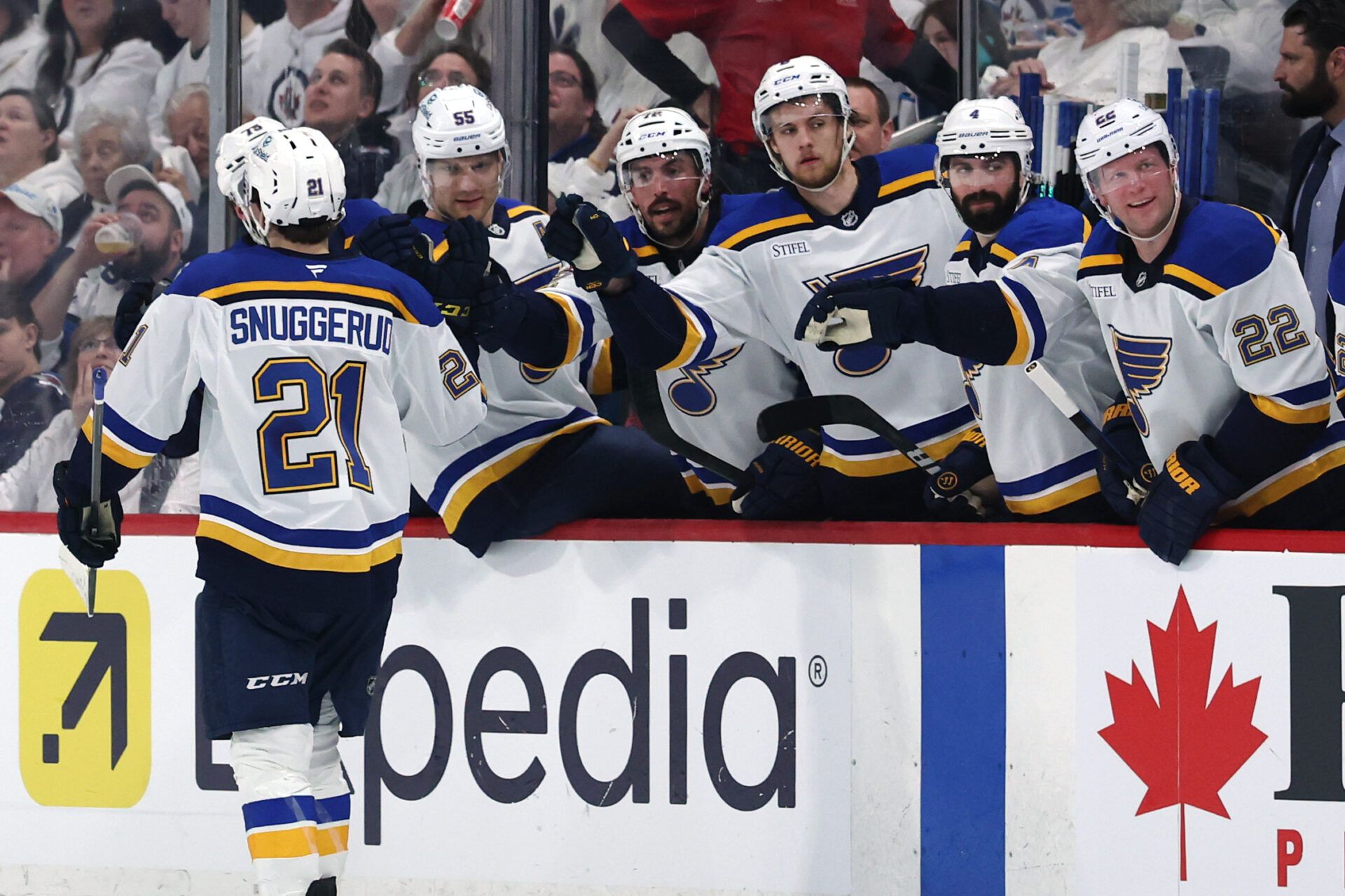 Apr 21, 2025; Winnipeg, Manitoba, CAN; St. Louis Blues right wing Jimmy Snuggerud (21) celebrates his goal against the Winnipeg Jets in the first period in game two of the first round of the 2025 Stanley Cup Playoffs at Canada Life Centre. Mandatory Credit: James Carey Lauder-Imagn Images