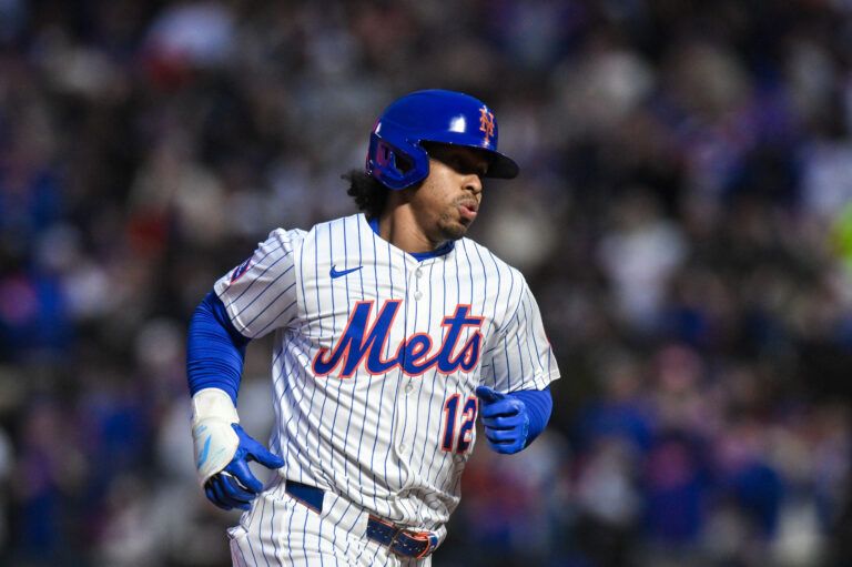 Apr 21, 2025; New York City, New York, USA; New York Mets shortstop Francisco Lindor (12) rounds the bases after hitting a solo home run against the Philadelphia Phillies during the first inning at Citi Field. Mandatory Credit: John Jones-Imagn Images